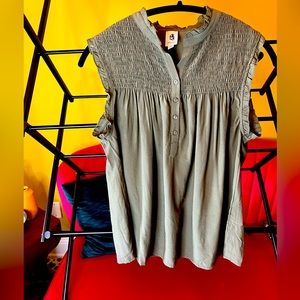 Green sleeveless Vici top